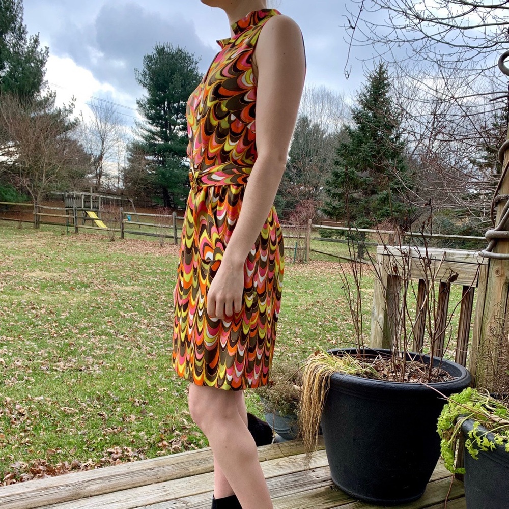Fun Milly 70s inspired dress with belt detail!